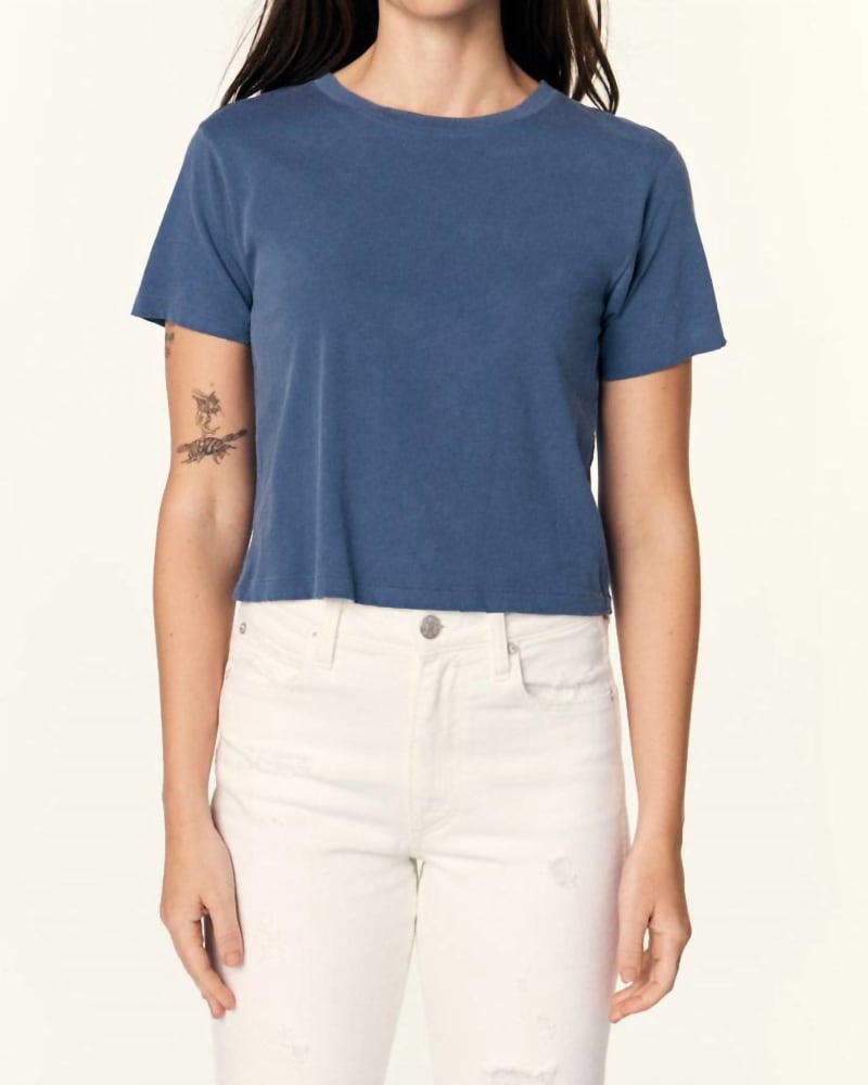 Front of a model wearing a size L Baby Tee in Deep Indigo in Deep Indigo by AMO. | dia_product_style_image_id:332297